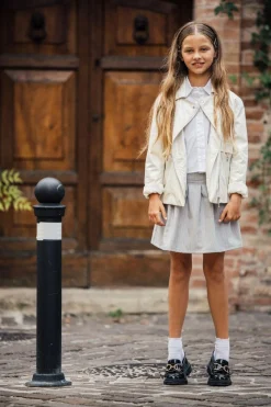 Chiodo in ecopelle con vestibilità over per bambina