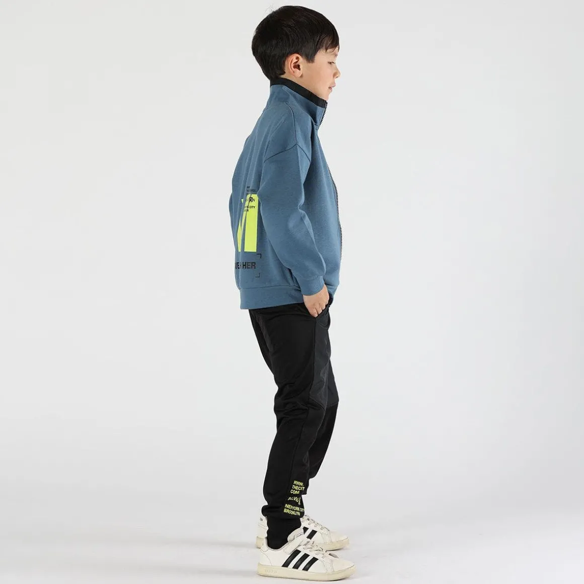 Maglia con zip da bambino