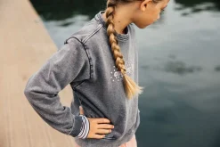 Maglia slavata a maniche lunghe per bambina