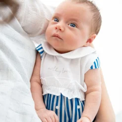 Pagliaccetto in jersey e tela da neonata