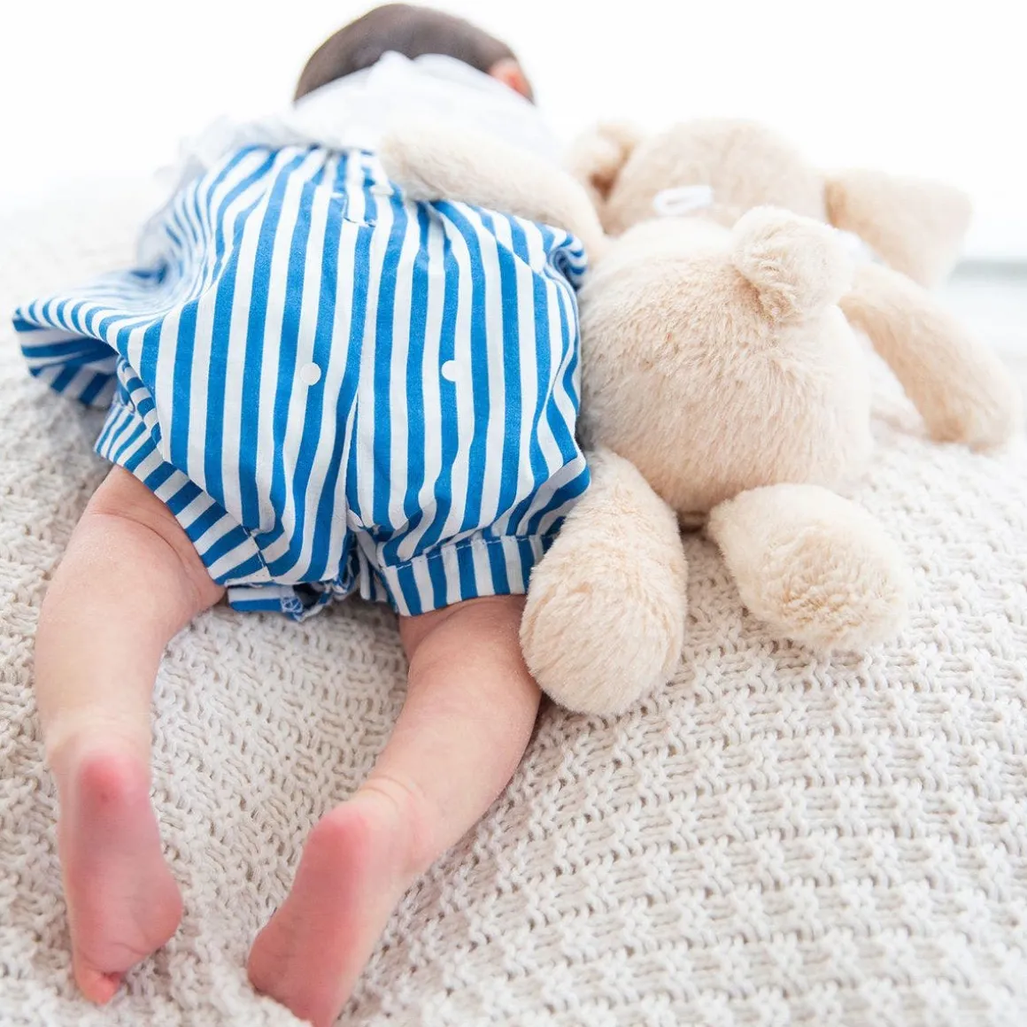 Pagliaccetto in jersey e tela da neonata