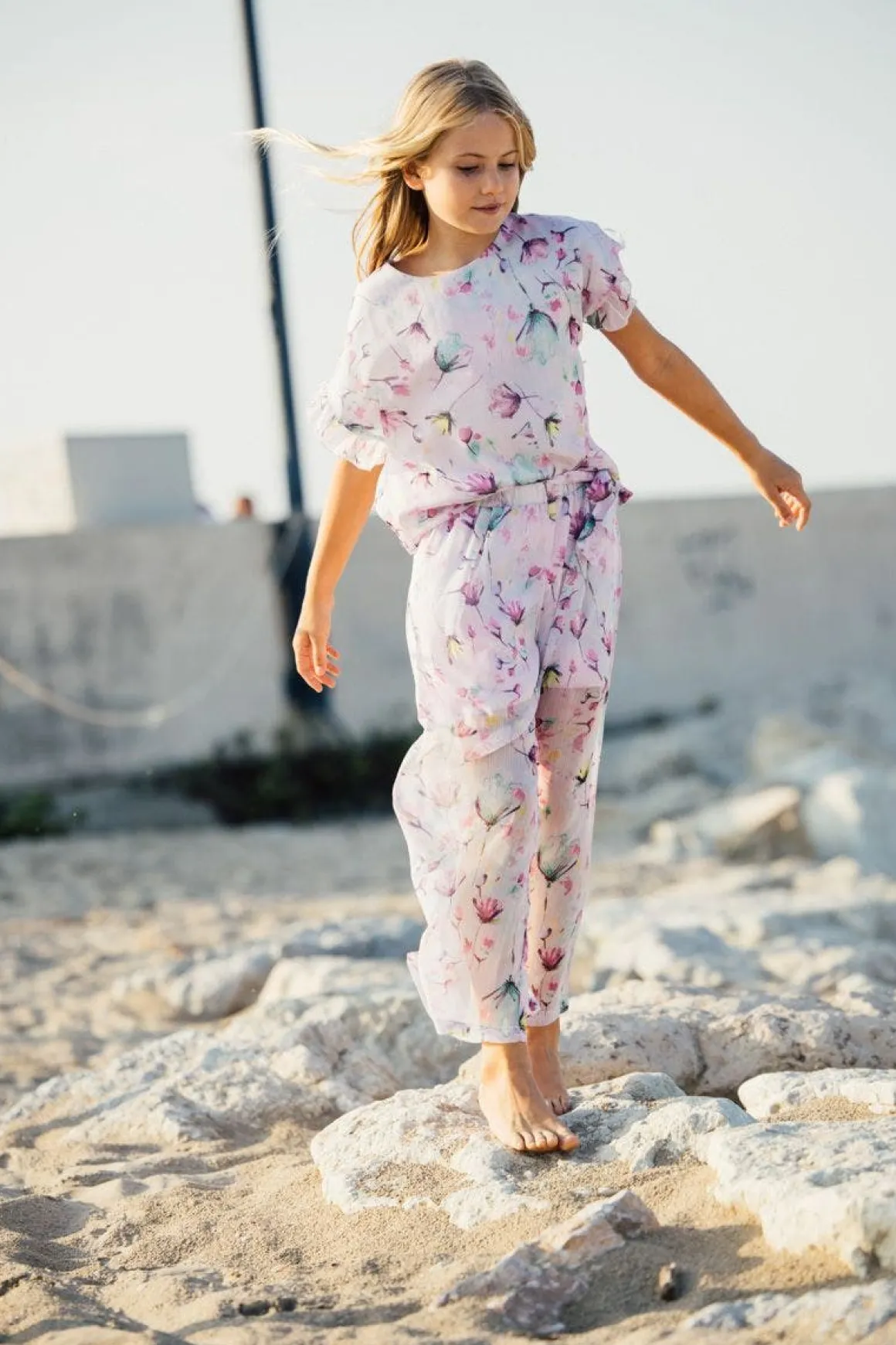 Pantalone in creponne stampato per bambina