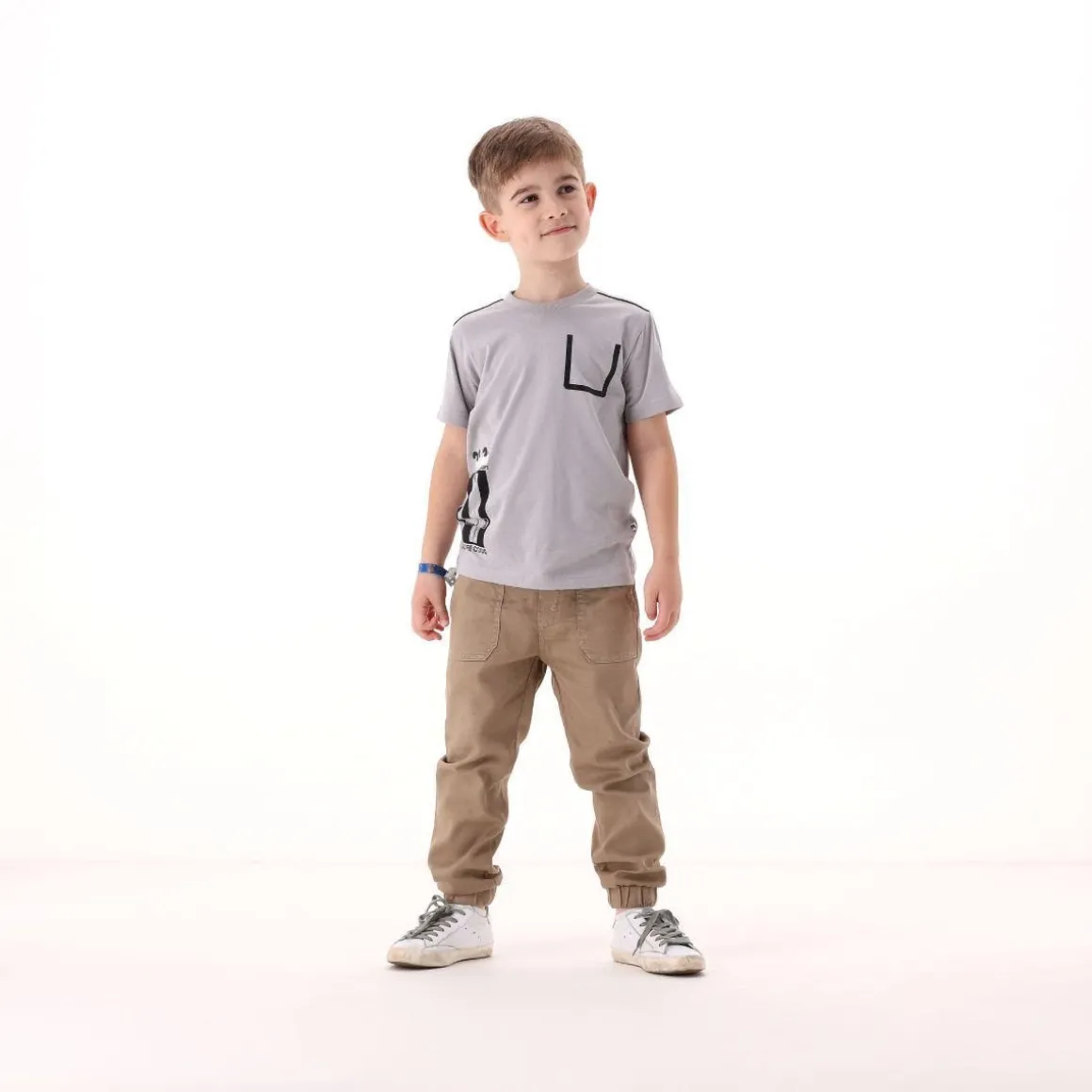 Pantalone in gabardina fiammata per bambino