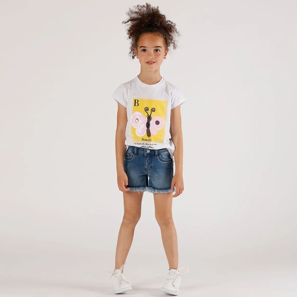 T-shirt con stampa e paillettes da bambina