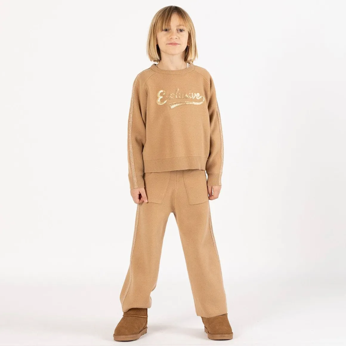 Tuta elegante in tricot per bambina