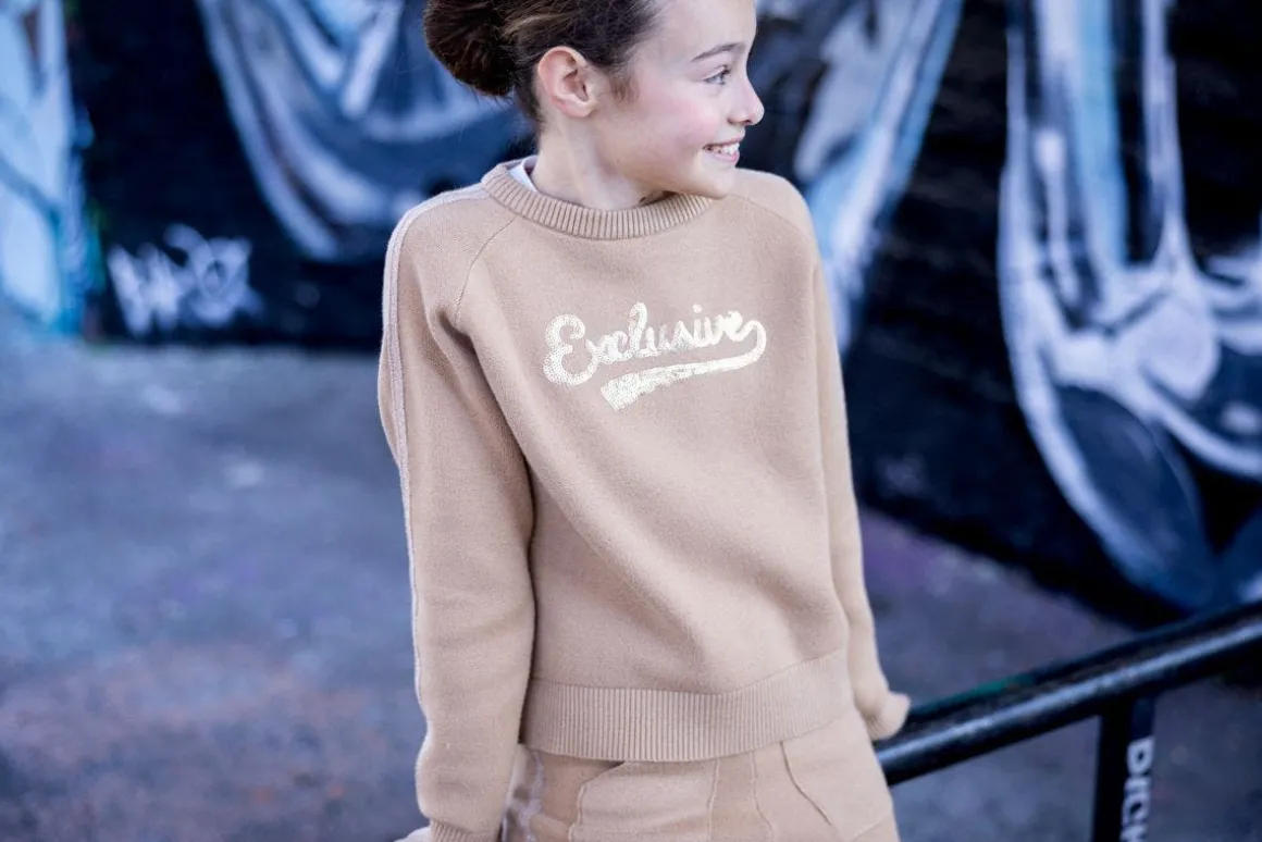 Tuta elegante in tricot per bambina