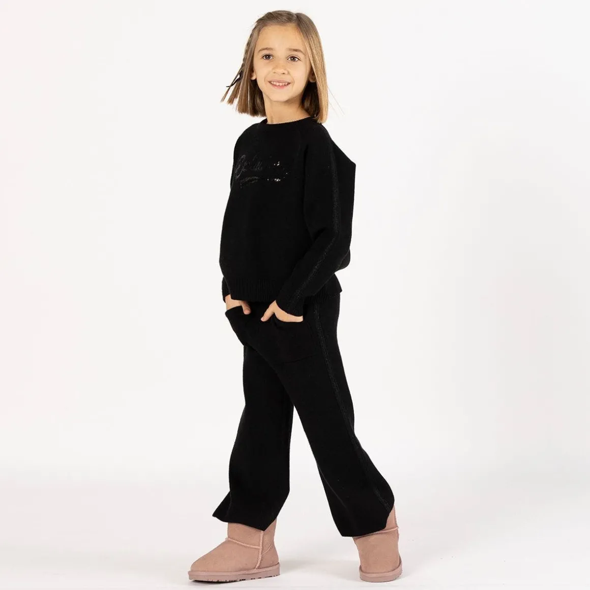 Tuta elegante in tricot per bambina