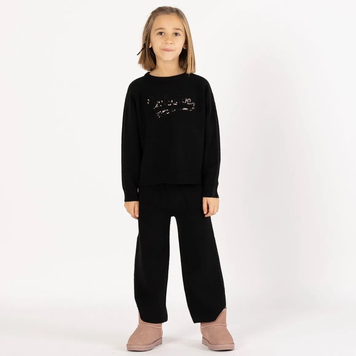 Tuta elegante in tricot per bambina