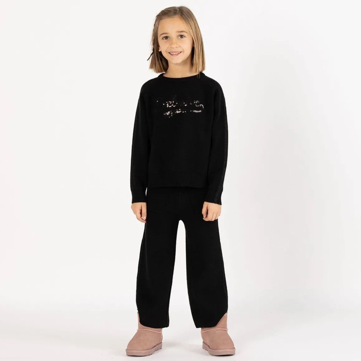 Tuta elegante in tricot per bambina