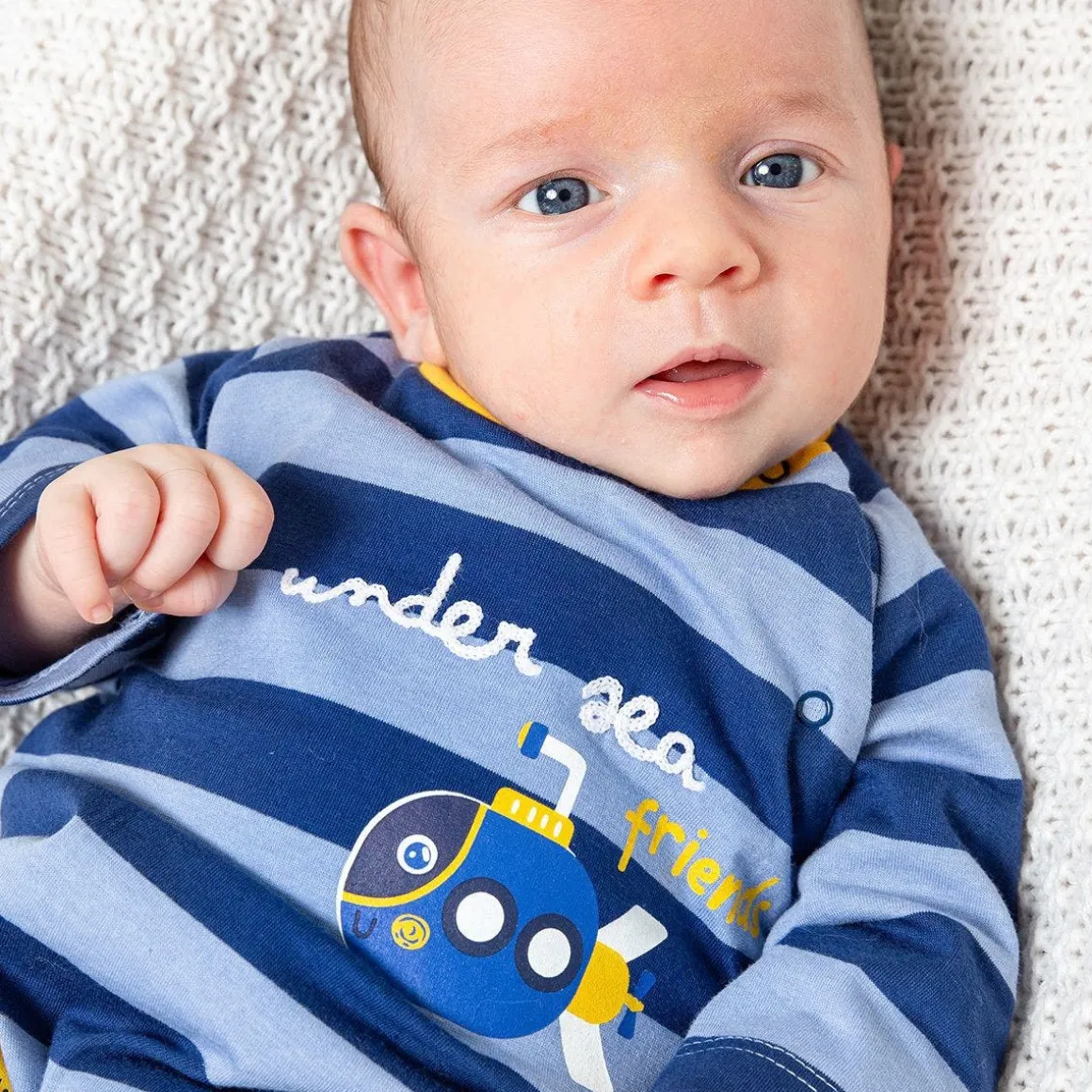 Tutina a righe blu da neonato