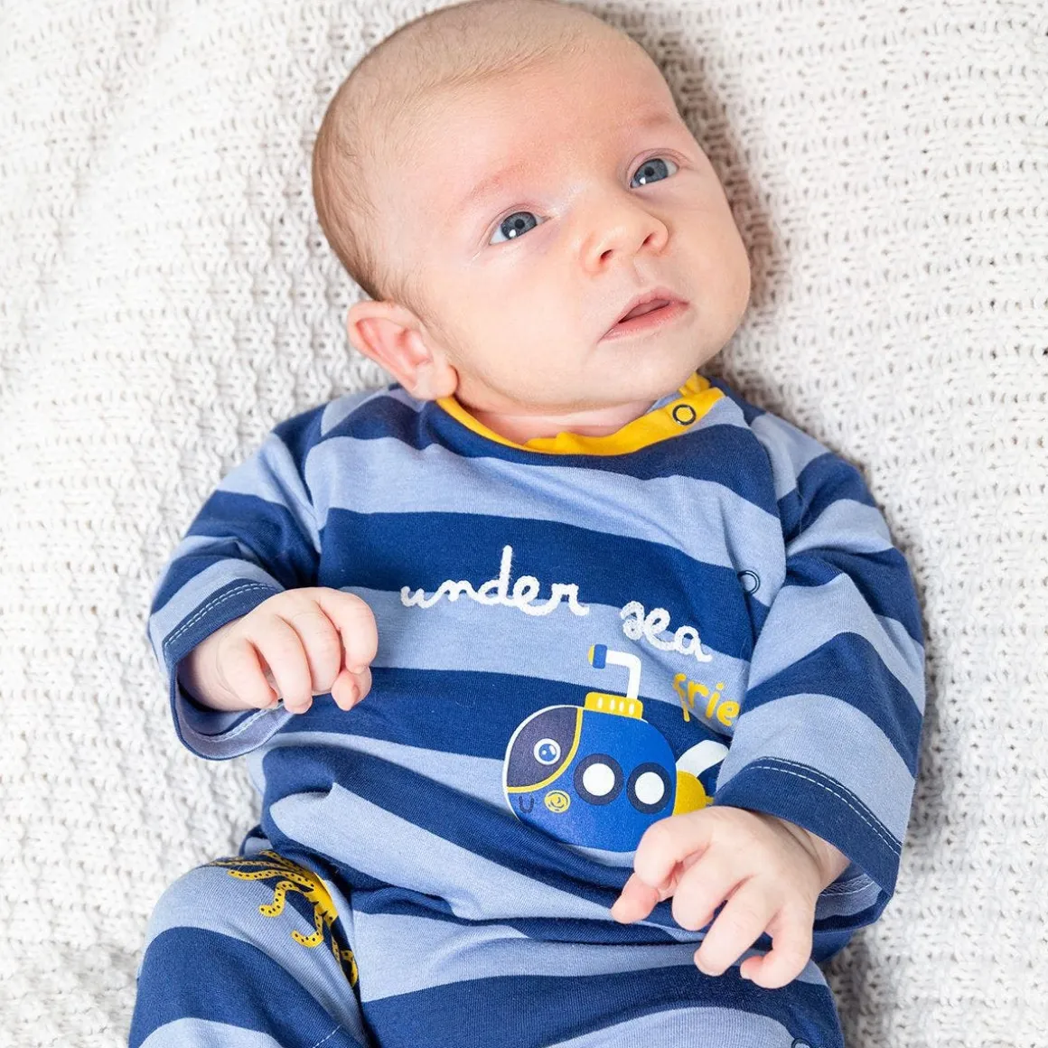 Tutina a righe blu da neonato