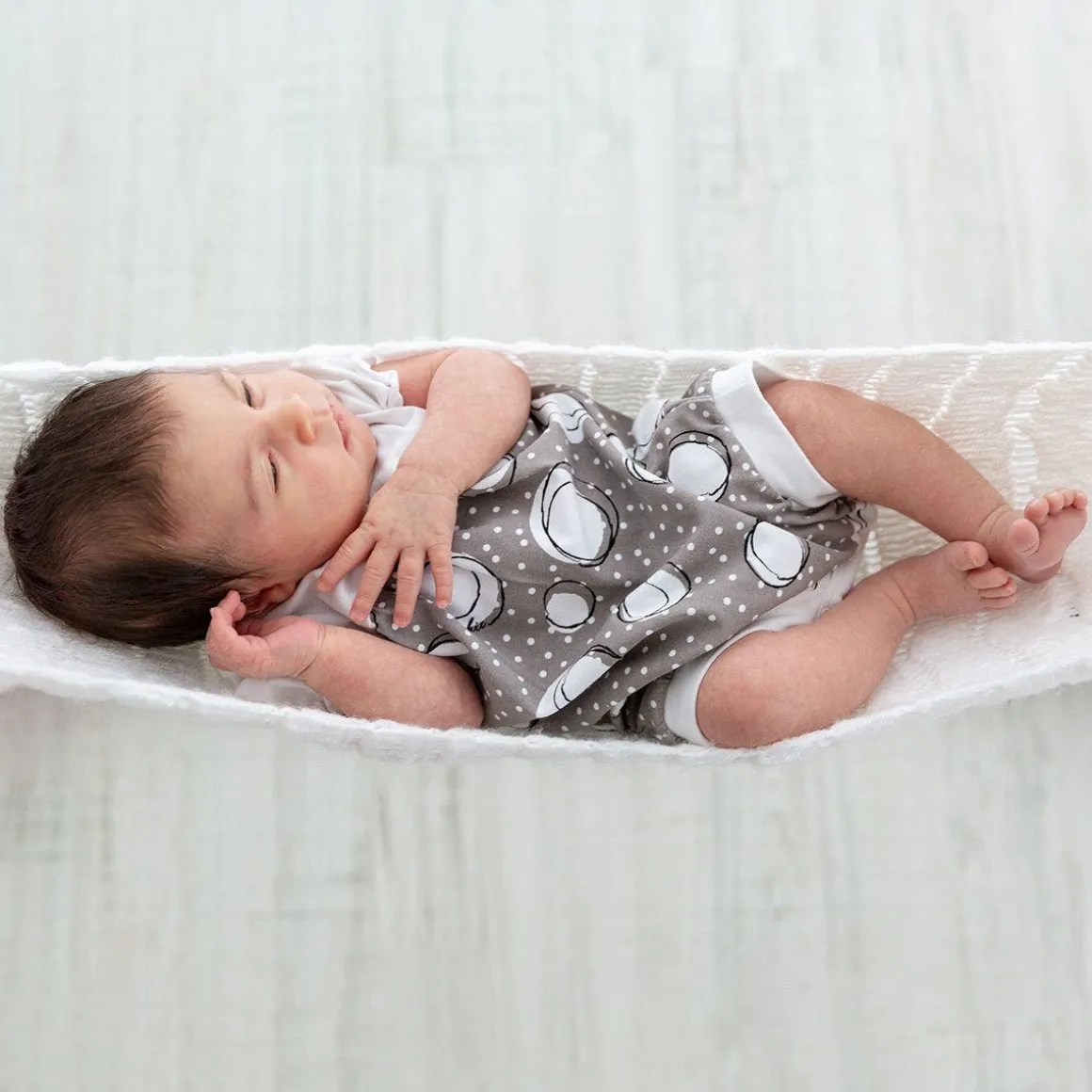Tutina in jersey con pois da neonata