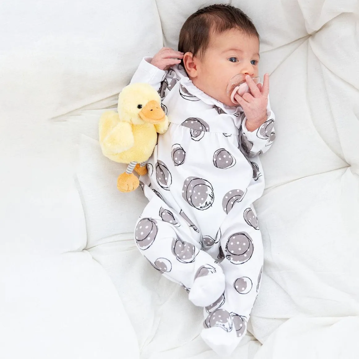 Tutina in jersey stampato da neonata